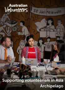 The cover page of the linked document. It includes the Australian Volunteers logo, and the title of the document: 'Supporting volunteerism in Asia Archipelago'. The background image is of three colleagues sitting at a table in a meeting.