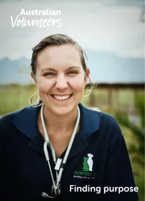 The cover page of the linked document. It includes the Australian Volunteers logo, and the title of the document: 'Finding purpose'. The background image is of a woman smiling directly into the camera and wearing a stethoscope around her neck.